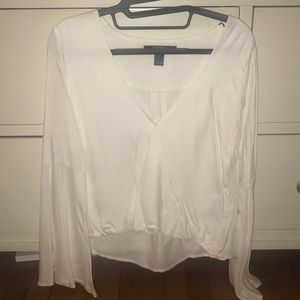 New cross front, bell sleeve blouse